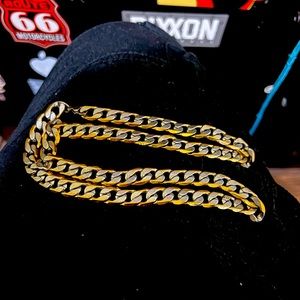 .925 Sterling Silver and Gold two tone Cuban Cut 26” long 12 mm wide chain.